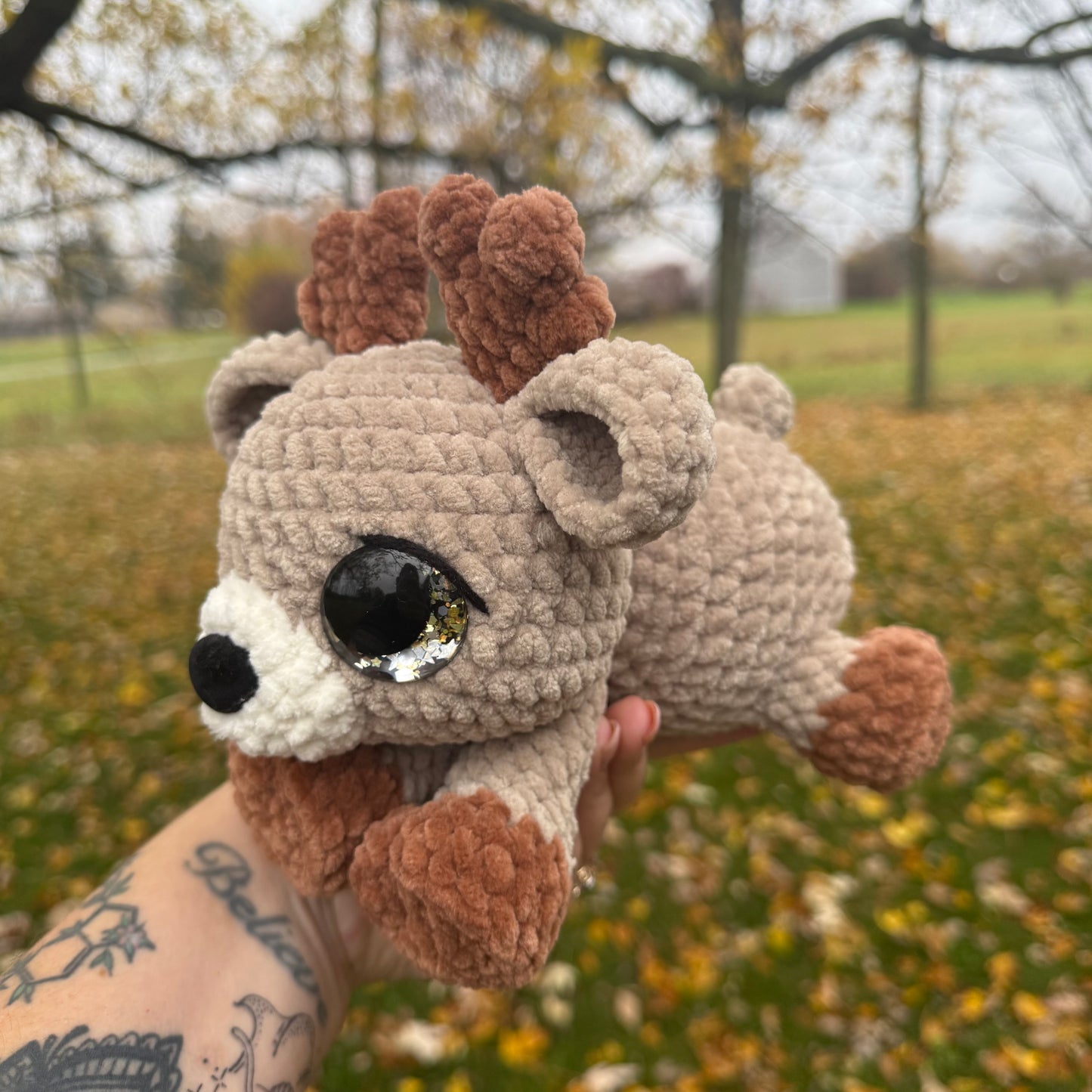 Laying reindeer plush